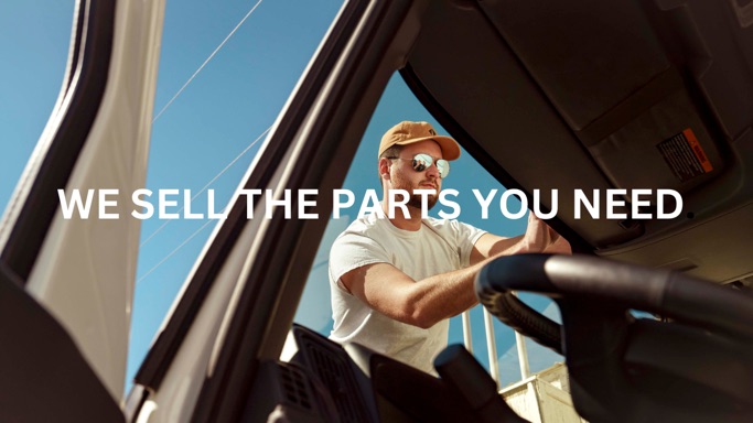 man working on vehicle parts