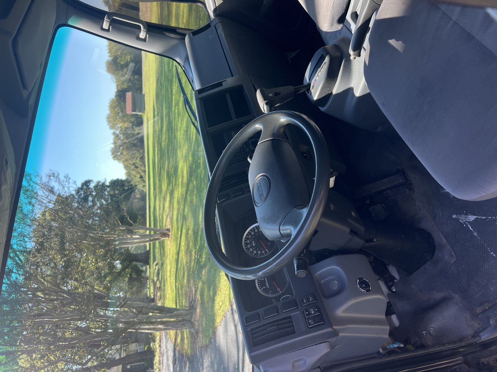 2014 Isuzu NPR HD cab interior, steering wheel and dashboard