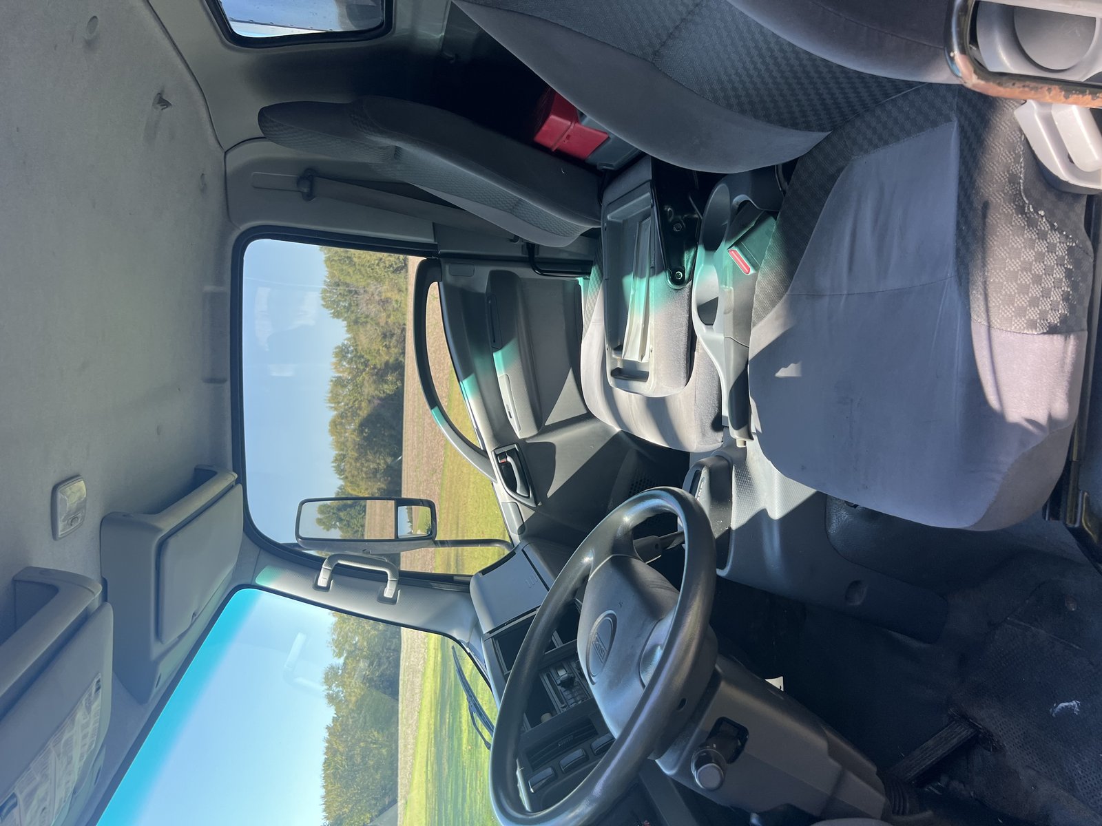 2014 Isuzu NPR HD cab interior seats and floor
